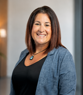 Portrait of Krista Page, Realtor® & Office Manager.